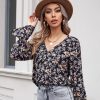 Lady’s V-neck chiffon floral top